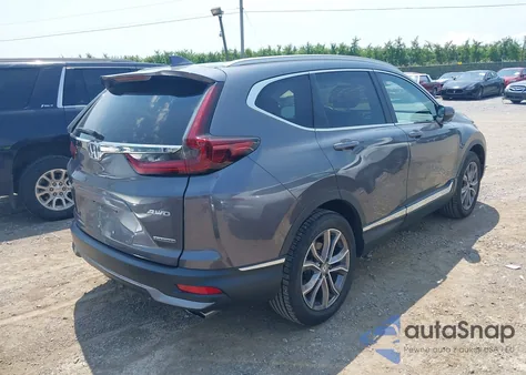 2021 Honda Cr-V Awd Touring z USA, uszkodzony, nr VIN 2HKRW2H94MH631640